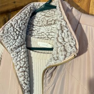 Lush tan sweater and blush Sherpa vest